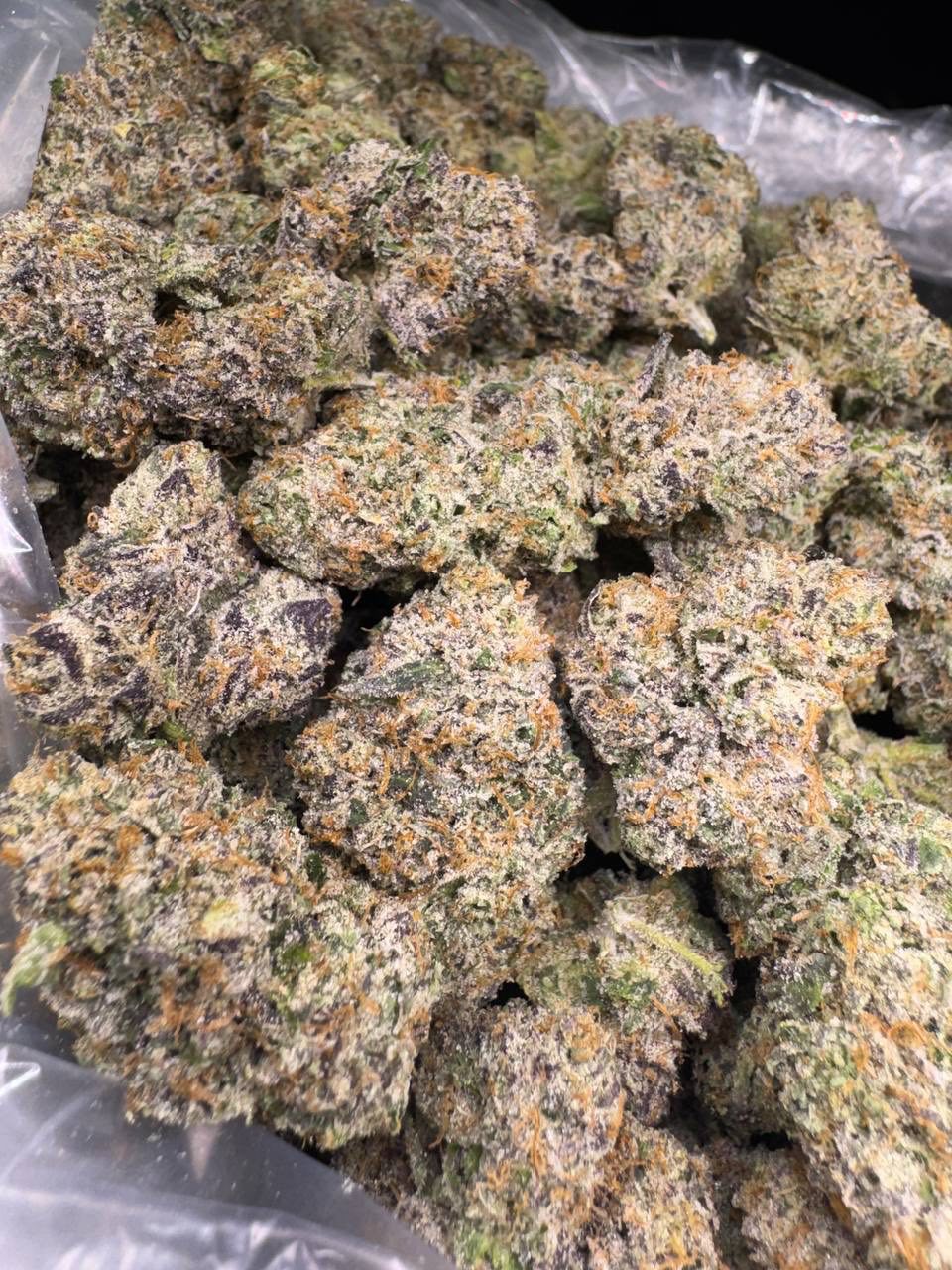 Pink Runtz bud — macro shot showing trichomes and structure